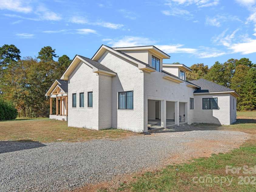 5039 Eliza Long Wilkie Drive, Huntersville, NC 28078.  MLS# CAR4240694, YatesRealty ID 21152. In construction- 3 car garage