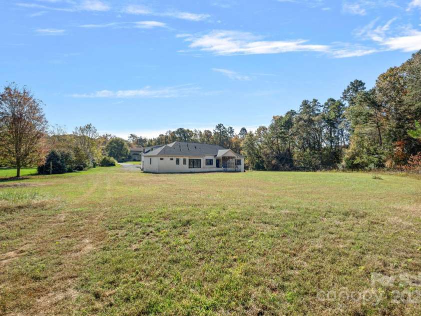 5039 Eliza Long Wilkie Drive, Huntersville, NC 28078.  MLS# CAR4240694, YatesRealty ID 21152. Large Backyard