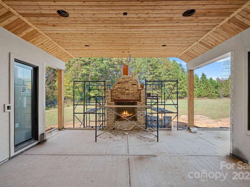 5039 Eliza Long Wilkie Drive, Huntersville, NC 28078.  MLS# CAR4240694, YatesRealty ID 21152. Outdoor living in construction