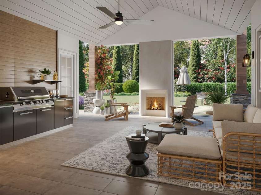 5039 Eliza Long Wilkie Drive, Huntersville, NC 28078.  MLS# CAR4240694, YatesRealty ID 21152. Virtually staged outdoor living: outdoor kitchen, fireplace, phantom screening