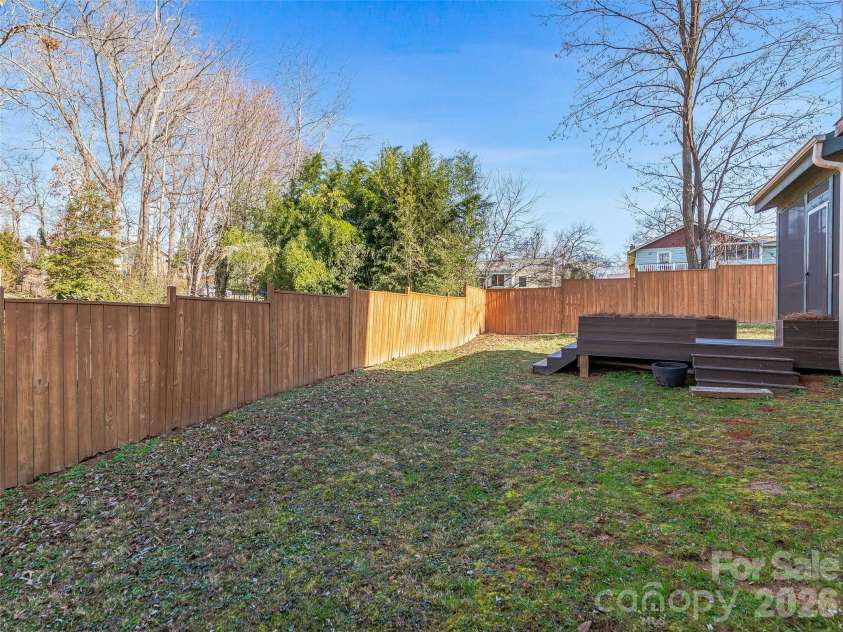 92 Middlemont Avenue, Asheville, NC 28806.  MLS# CAR4334470, YatesRealty ID 21159. Large level side yard for entertaining