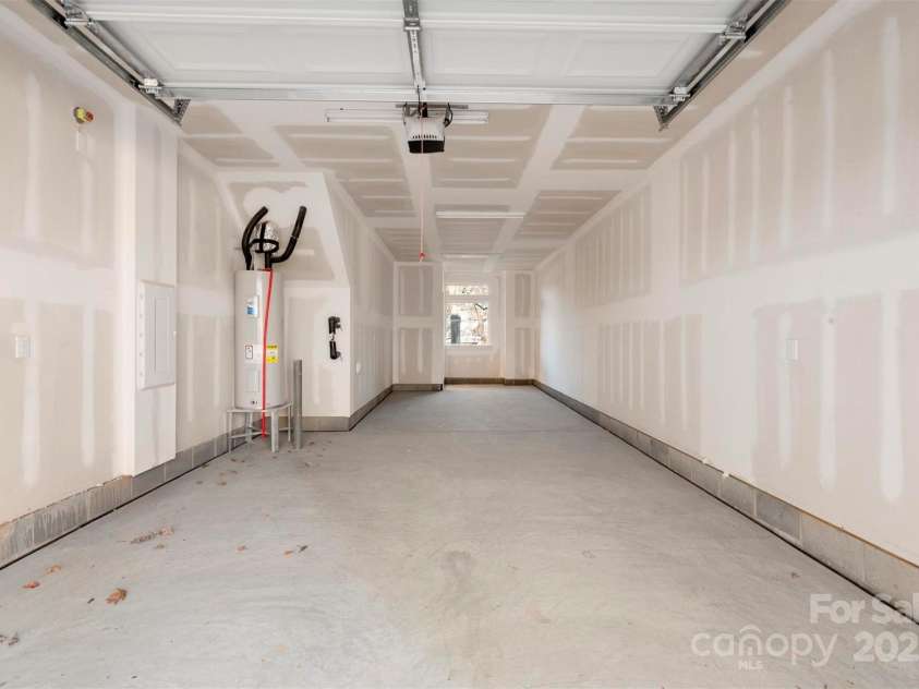 1411 Collier Walk Alley, Charlotte, NC 28205.  MLS# CAR4138994, YatesRealty ID 21160. 2-car tandem garage