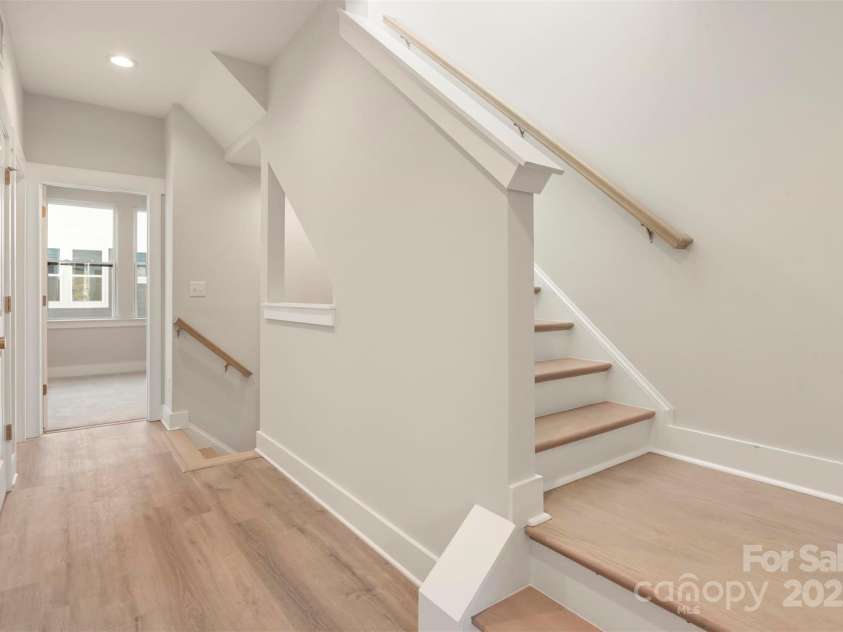 1411 Collier Walk Alley, Charlotte, NC 28205.  MLS# CAR4138994, YatesRealty ID 21160. 3rd floor landing