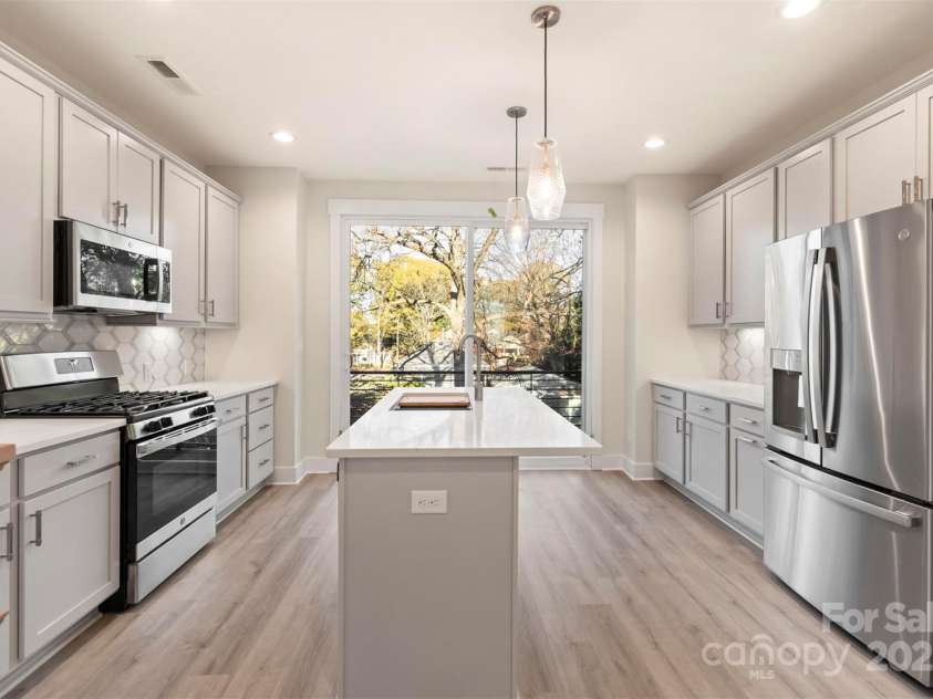 1411 Collier Walk Alley, Charlotte, NC 28205.  MLS# CAR4138994, YatesRealty ID 21160. 