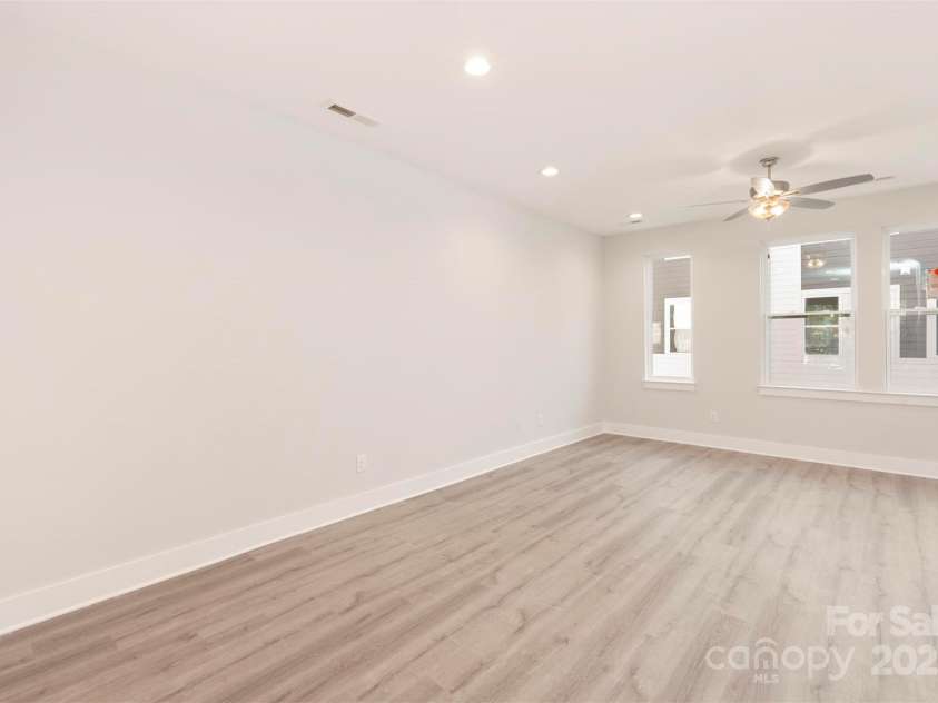 1411 Collier Walk Alley, Charlotte, NC 28205.  MLS# CAR4138994, YatesRealty ID 21160. Dining & Living