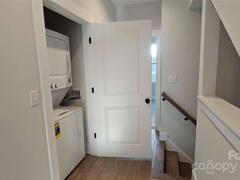 1211 34th Street, Charlotte, NC 28205.  MLS# CAR4139004, YatesRealty ID 21161. 3rd floor landing & laundry