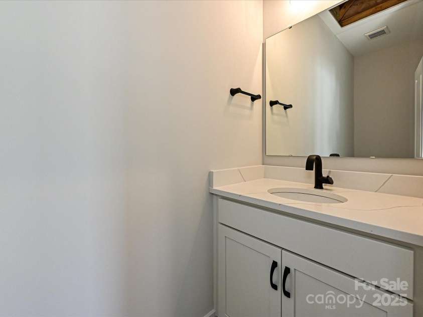 1211 34th Street, Charlotte, NC 28205.  MLS# CAR4139004, YatesRealty ID 21161. Rec Room Powder Room