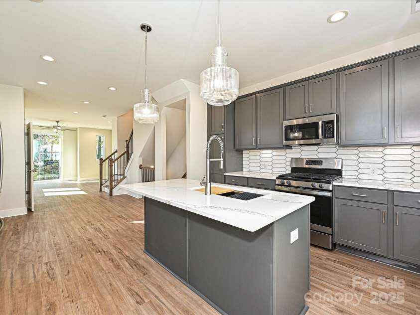 1219 34th Street, Charlotte, NC 28205.  MLS# CAR4139010, YatesRealty ID 21163. Kitchen/Dining/Living