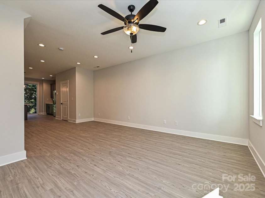 1419 Collier Walk Alley, Charlotte, NC 28205.  MLS# CAR4197769, YatesRealty ID 21164. Living/Dining/Kitchen
