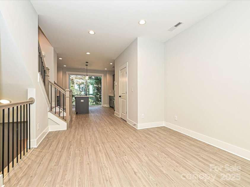 1419 Collier Walk Alley, Charlotte, NC 28205.  MLS# CAR4197769, YatesRealty ID 21164. Living/Dining/Kitchen