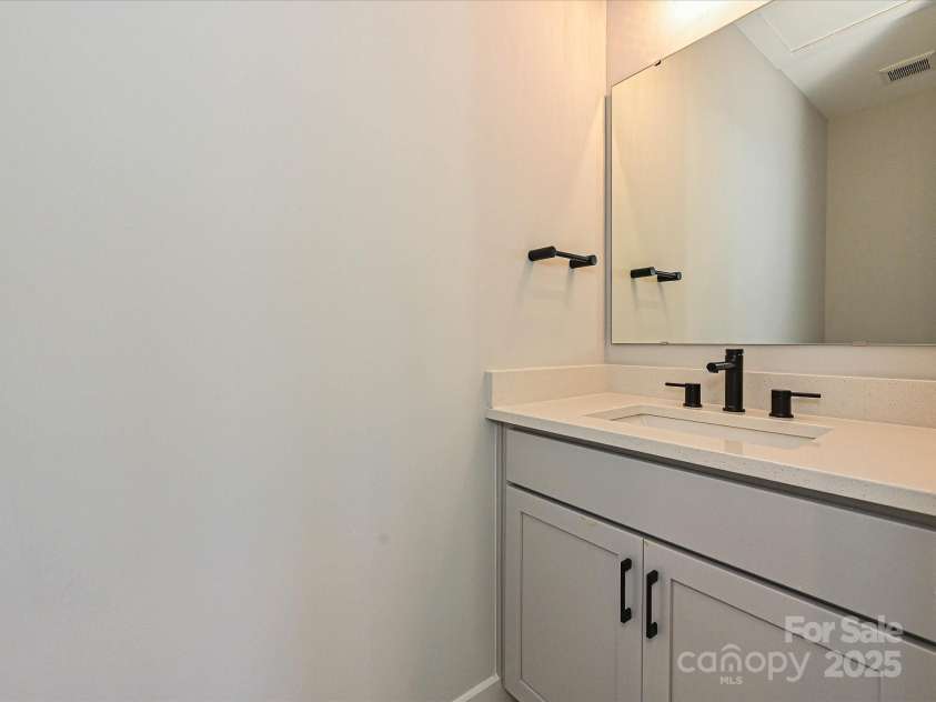 1419 Collier Walk Alley, Charlotte, NC 28205.  MLS# CAR4197769, YatesRealty ID 21164. Rec Room Powder Room