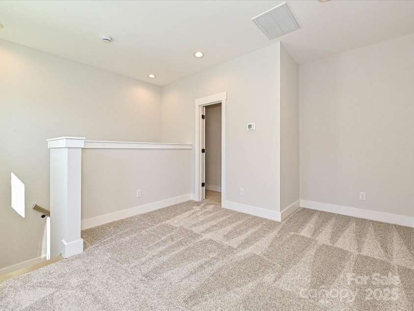 1419 Collier Walk Alley, Charlotte, NC 28205.  MLS# CAR4197769, YatesRealty ID 21164. Rec Room with Powder Room