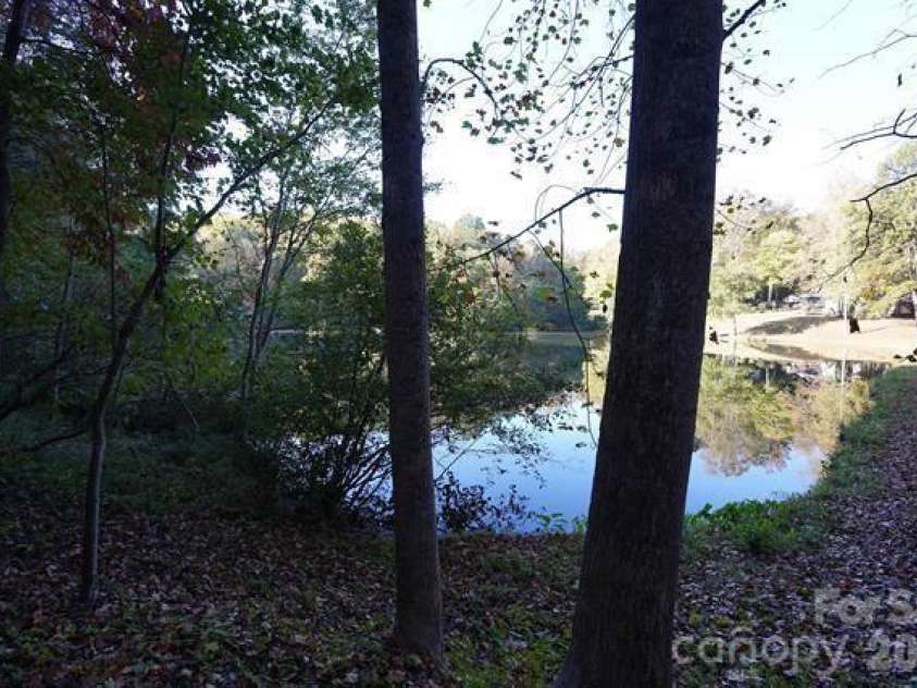 16 Forest Drive, Travelers Rest, SC 29690.  MLS# CAR4315401, YatesRealty ID 21165. 