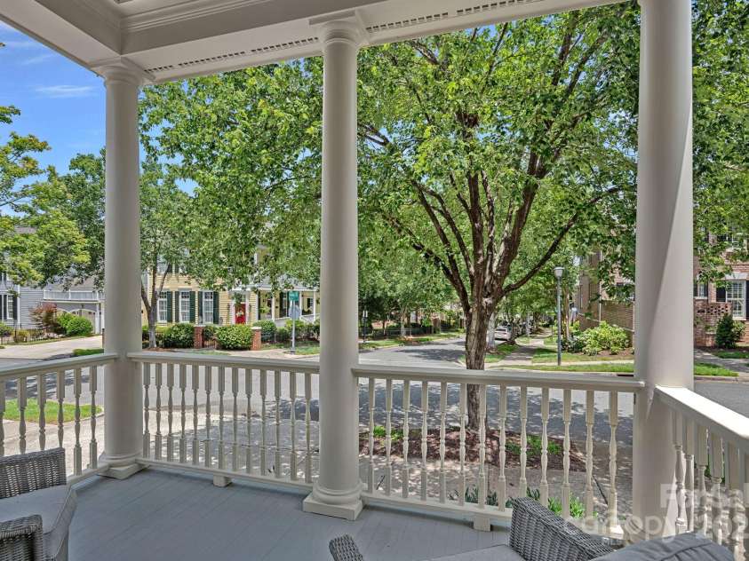 202 Caldwell Lane, Davidson, NC 28036.  MLS# CAR4269937, YatesRealty ID 21169. Charming front porch off of sitting room
