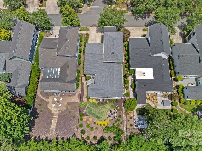 202 Caldwell Lane, Davidson, NC 28036.  MLS# CAR4269937, YatesRealty ID 21169. Easily see the significant landscaping the owners have added to the backyard