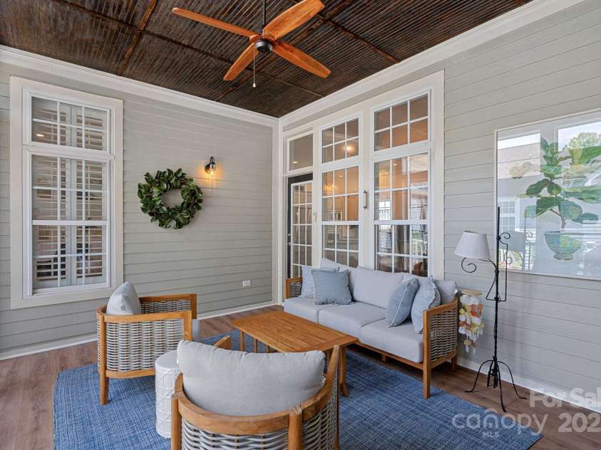 202 Caldwell Lane, Davidson, NC 28036.  MLS# CAR4269937, YatesRealty ID 21169. Enjoy a morning coffee or an afternoon/evening beverage on the screened-in porch with new Eze-Breeze windows