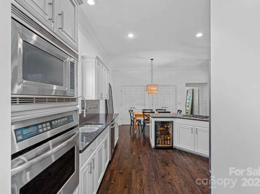 202 Caldwell Lane, Davidson, NC 28036.  MLS# CAR4269937, YatesRealty ID 21169. Entry to gourmet kitchen from the dining room