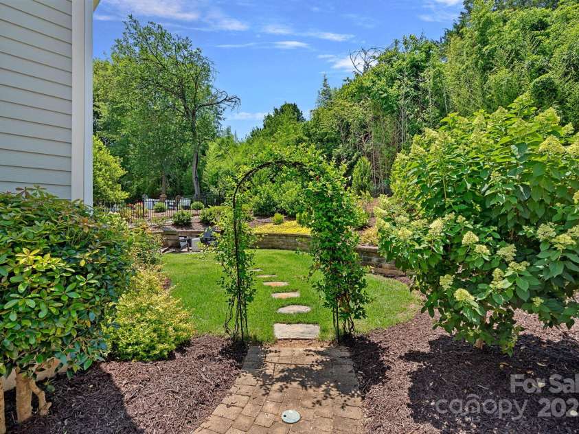 202 Caldwell Lane, Davidson, NC 28036.  MLS# CAR4269937, YatesRealty ID 21169. Take in the outdoors with a fully fenced backyard