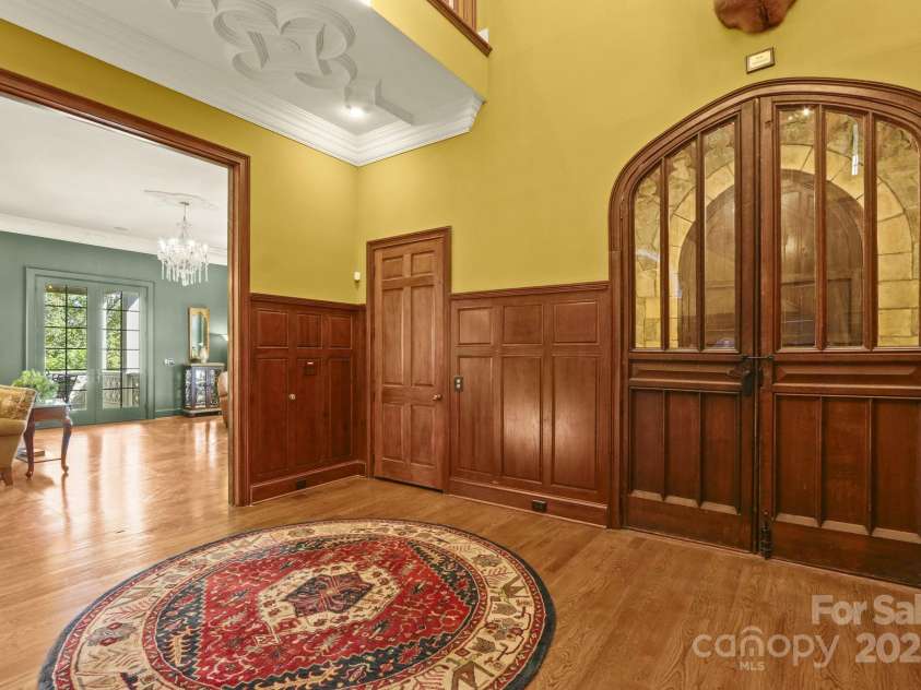 5742 NC Highway 194 None, Banner Elk, NC 28604.  MLS# CAR4309269, YatesRealty ID 2117. 500+ year-old arched entry doors at Foyer; imported from English church