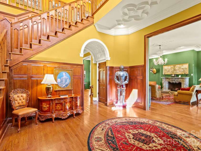 5742 NC Highway 194 None, Banner Elk, NC 28604.  MLS# CAR4309269, YatesRealty ID 2117. Foyer with high ceilings & antique chandelier imported from Princeton University