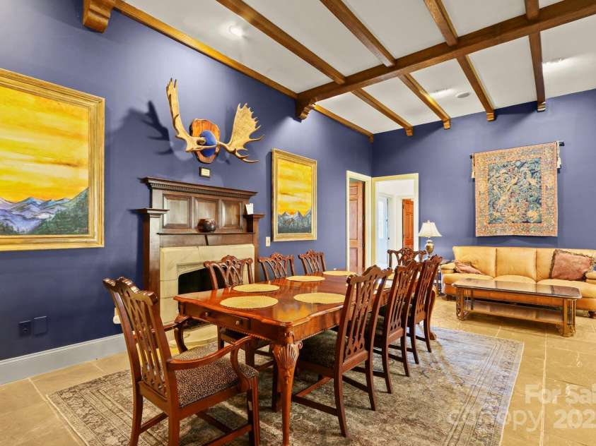 5742 NC Highway 194 None, Banner Elk, NC 28604.  MLS# CAR4309269, YatesRealty ID 2117. Informal dining area off kitchen with antique stone fireplace