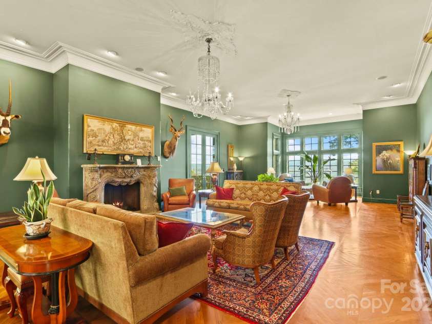 5742 NC Highway 194 None, Banner Elk, NC 28604.  MLS# CAR4309269, YatesRealty ID 2117. Spacious Great Room with antique stone fireplace