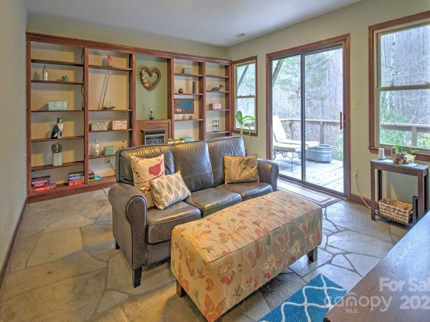 9374 Holbert Cove Road, Saluda, NC 28773.  MLS# CAR4227535, YatesRealty ID 2117. Family room