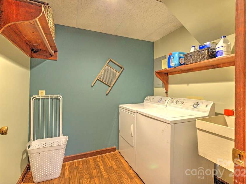 9374 Holbert Cove Road, Saluda, NC 28773.  MLS# CAR4227535, YatesRealty ID 2117. Laundry room