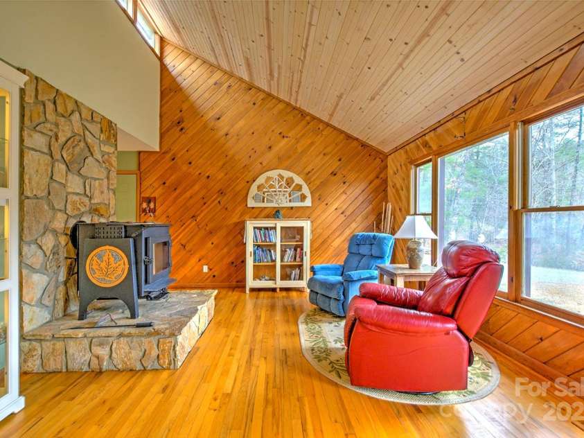 9374 Holbert Cove Road, Saluda, NC 28773.  MLS# CAR4227535, YatesRealty ID 2117. Living room 1