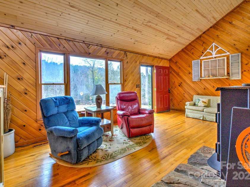 9374 Holbert Cove Road, Saluda, NC 28773.  MLS# CAR4227535, YatesRealty ID 2117. Living room 2