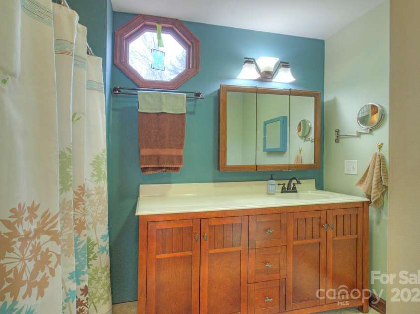 9374 Holbert Cove Road, Saluda, NC 28773.  MLS# CAR4227535, YatesRealty ID 2117. Primary bath