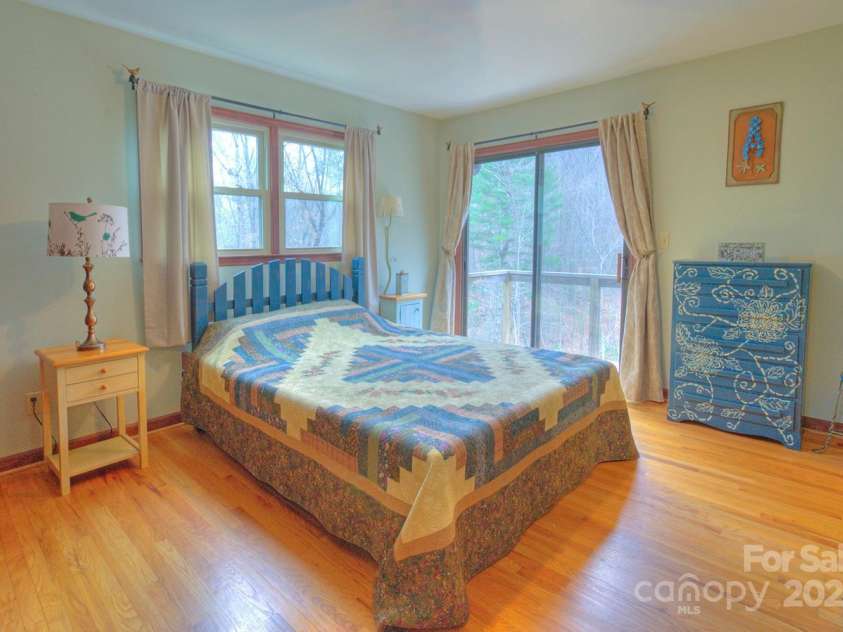 9374 Holbert Cove Road, Saluda, NC 28773.  MLS# CAR4227535, YatesRealty ID 2117. Primary bedroom