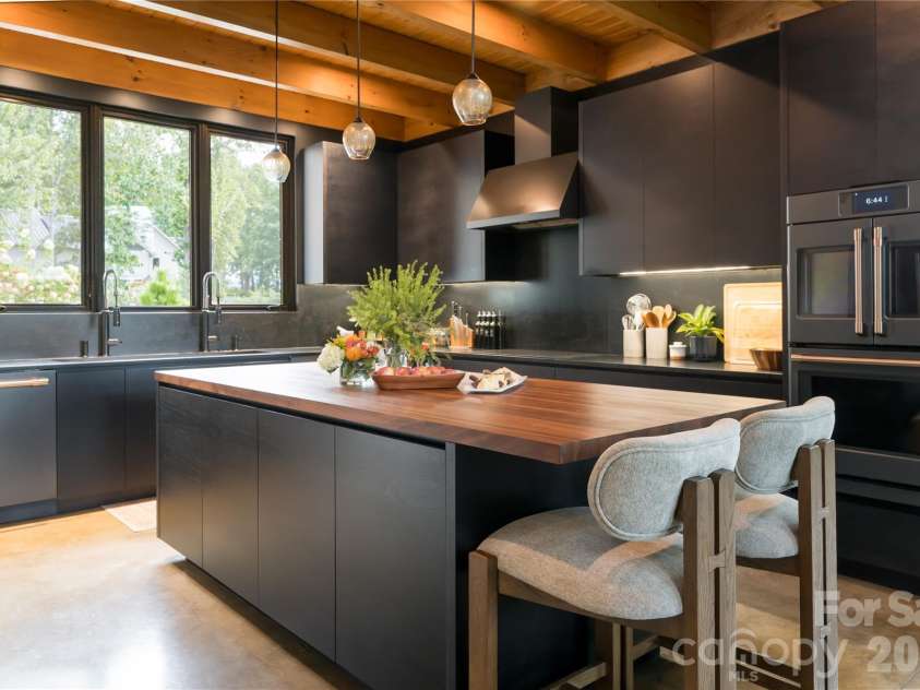 13 Tulip Poplar Trail, Asheville, NC 28804.  MLS# CAR4352728, YatesRealty ID 21170. Custom walnut island countertop