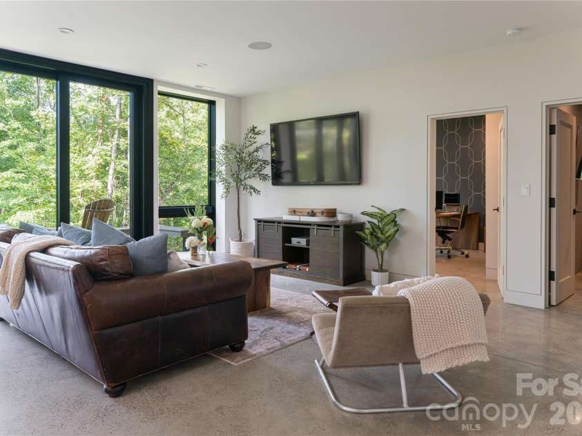 13 Tulip Poplar Trail, Asheville, NC 28804.  MLS# CAR4352728, YatesRealty ID 21170. Downstairs den