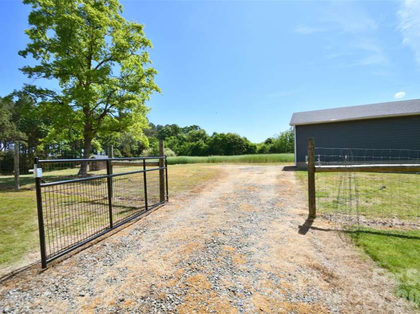 36276 Vick Road, New London, NC 28127.  MLS# CAR4376882, YatesRealty ID 21171. 
