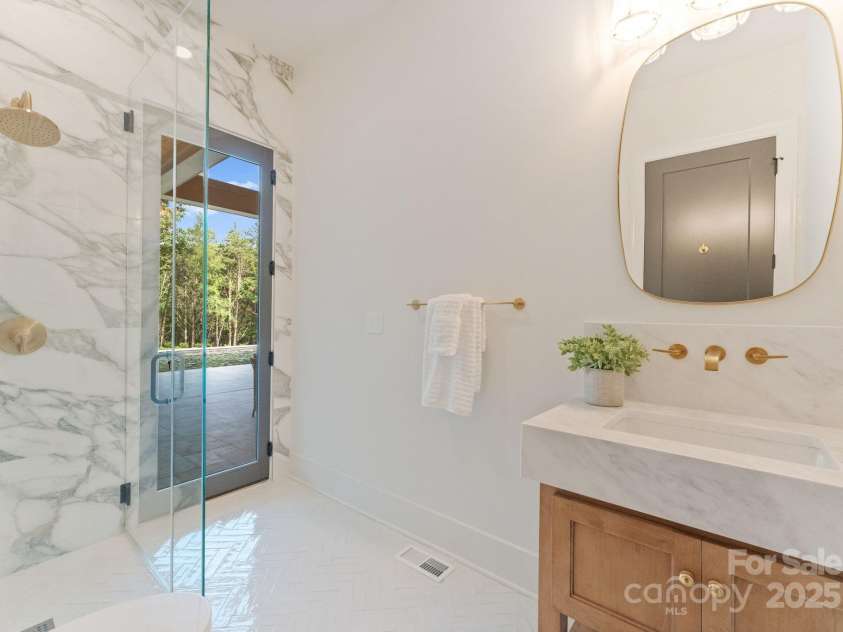 15037 June Washam Road, Davidson, NC 28036.  MLS# CAR4268834, YatesRealty ID 21172. Pool Bath