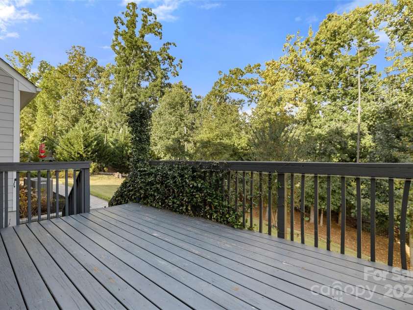 16001 Arabian Mews Lane, Charlotte, NC 28278.  MLS# CAR4298633, YatesRealty ID 21172. Deck overlooking private back yard