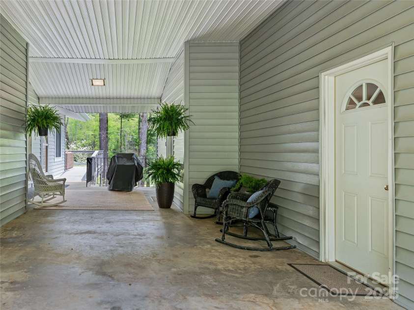 29 Robinhood Road, Asheville, NC 28804.  MLS# CAR4202474, YatesRealty ID 21176. Great Breezway connecting the home and guest suite