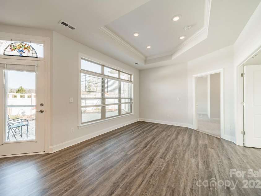 1005 Headwaters Court, Matthews, NC 28104.  MLS# CAR4233423, YatesRealty ID 21177. Dining area off the office and Primary bedroom