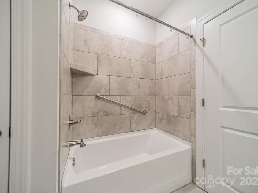 1005 Headwaters Court, Matthews, NC 28104.  MLS# CAR4233423, YatesRealty ID 21177. Guest bathroom