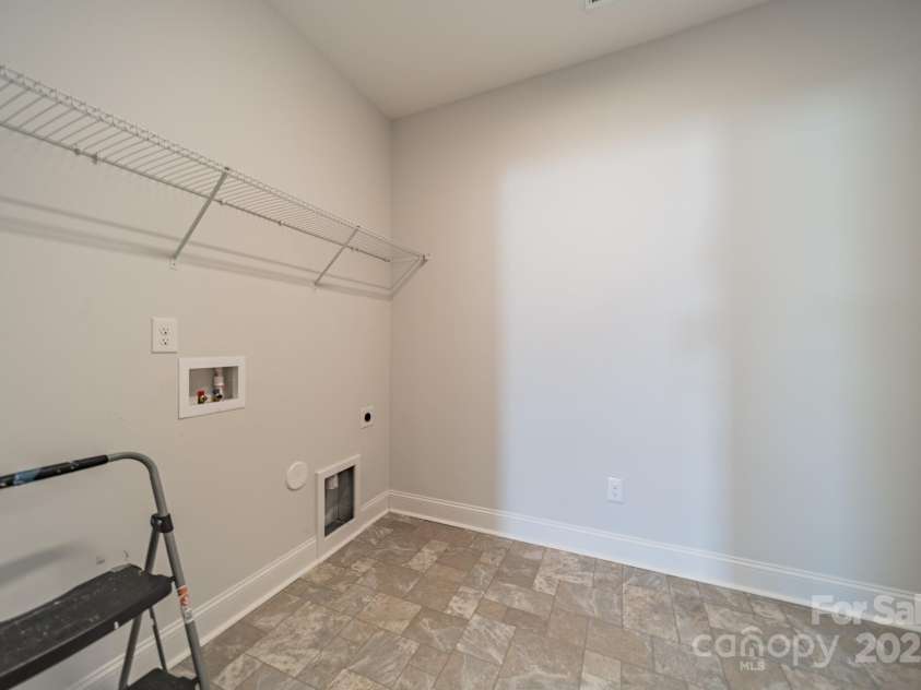 1005 Headwaters Court, Matthews, NC 28104.  MLS# CAR4233423, YatesRealty ID 21177. Laundry room