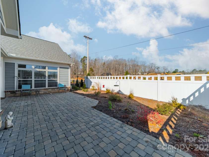 1005 Headwaters Court, Matthews, NC 28104.  MLS# CAR4233423, YatesRealty ID 21177. Over-sized patio made from stone pavers