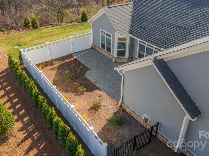 1005 Headwaters Court, Matthews, NC 28104.  MLS# CAR4233423, YatesRealty ID 21177. Privacy fence in back