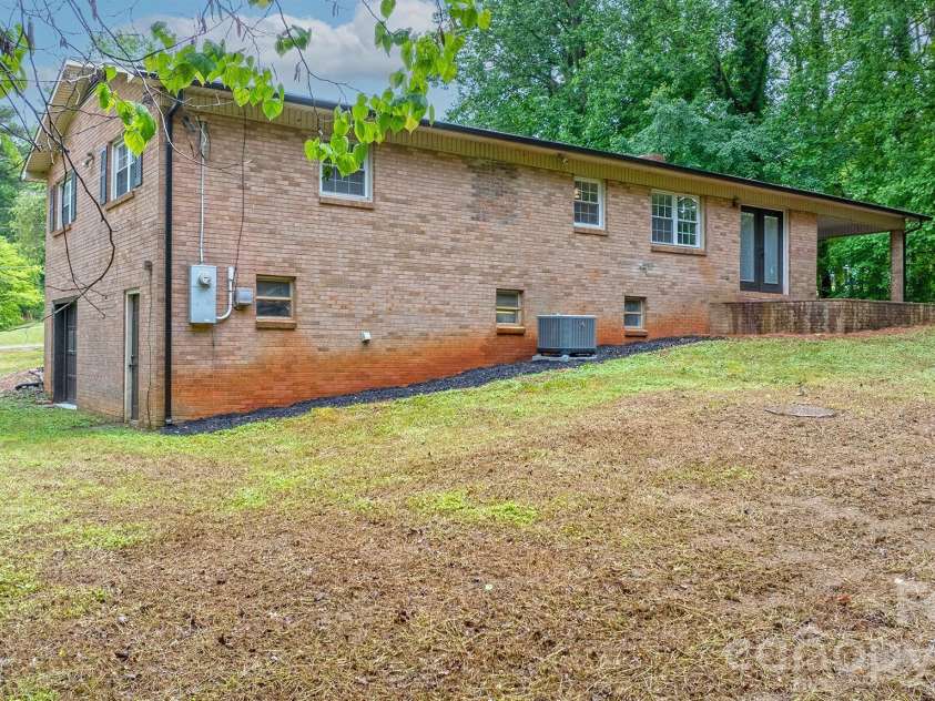 1871 Crestview Drive, Newton, NC 28658.  MLS# CAR4379075, YatesRealty ID 21177. Back of Home and Back Yard