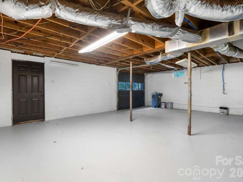 1871 Crestview Drive, Newton, NC 28658.  MLS# CAR4379075, YatesRealty ID 21177. Basement Garage Area