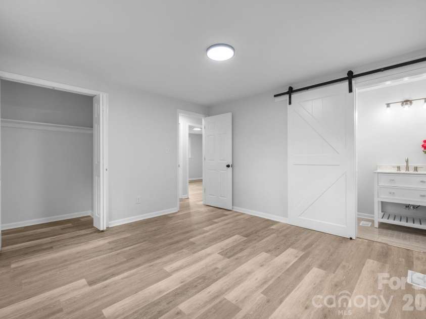 1871 Crestview Drive, Newton, NC 28658.  MLS# CAR4379075, YatesRealty ID 21177. Primary Bedroom