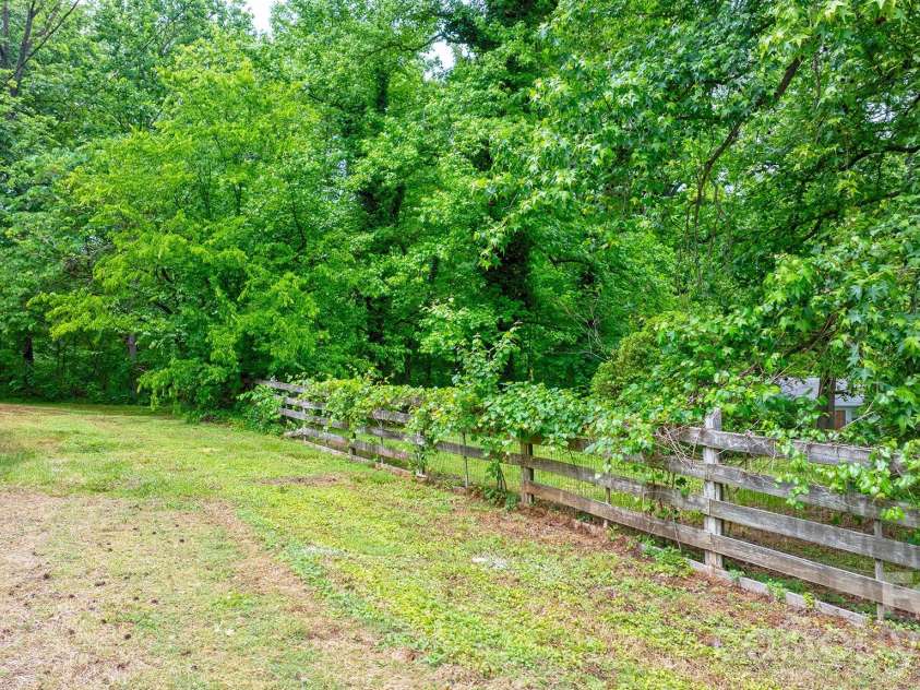 1871 Crestview Drive, Newton, NC 28658.  MLS# CAR4379075, YatesRealty ID 21177. Side Yard