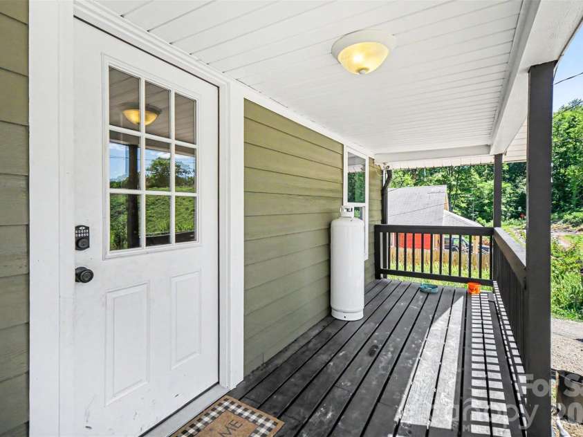 12 Bost Avenue, Concord, NC 28027.  MLS# CAR4381096, YatesRealty ID 2118. Covered front porch