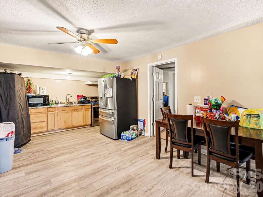 12 Bost Avenue, Concord, NC 28027.  MLS# CAR4381096, YatesRealty ID 2118. Dining and kitchen
