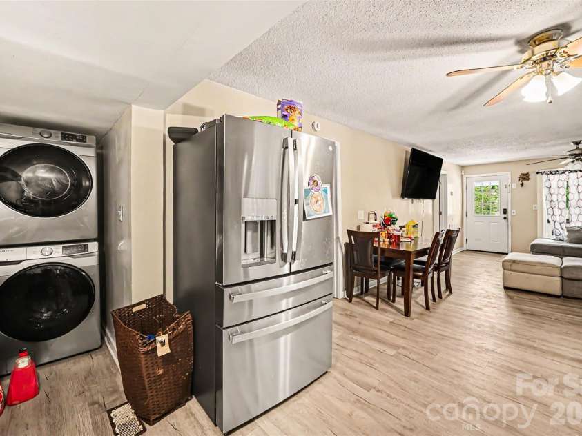 12 Bost Avenue, Concord, NC 28027.  MLS# CAR4381096, YatesRealty ID 2118. Kitchen and laundry